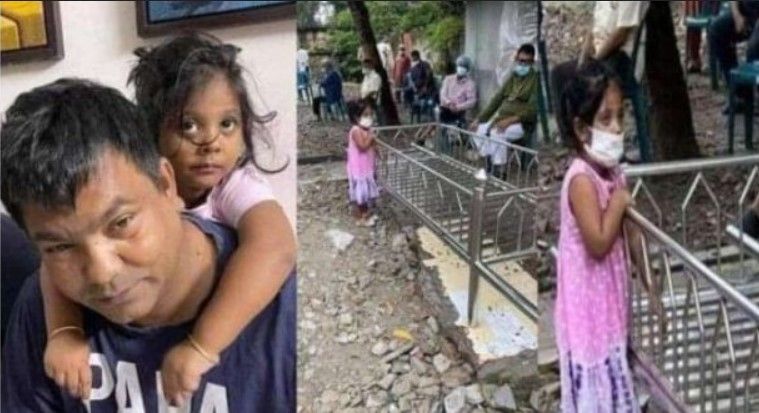 বাবা এসে এখানে ঘুমাবে, তাই বাবার খাট ধরে দাঁড়িয়ে আছে ছোট্ট মেয়েটি